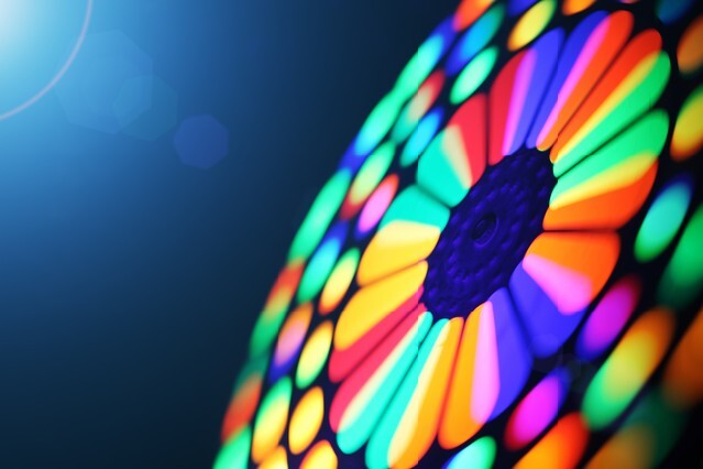 Illuminated colorful spectrum spinning wheel